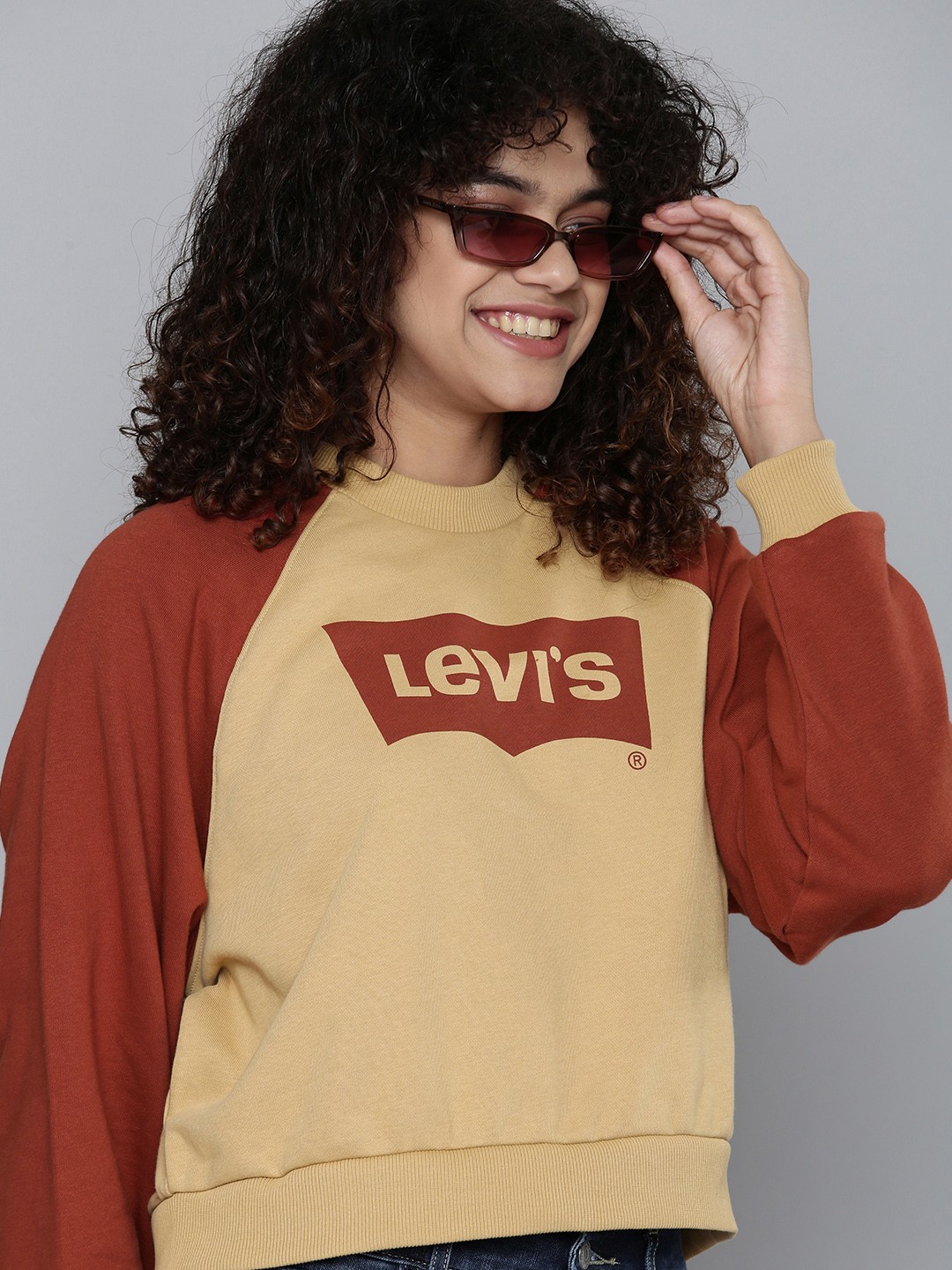 

Levis Women Beige & Red Brand logo Printed Sweatshirt, Orange