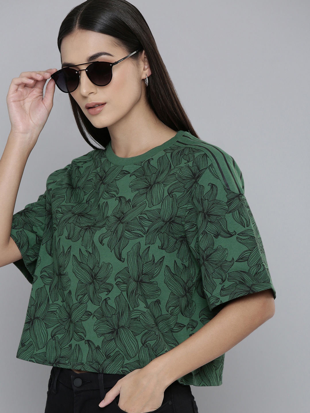 

Levis Women Green & Black Floral Print Extended Sleeves Pure Cotton Top