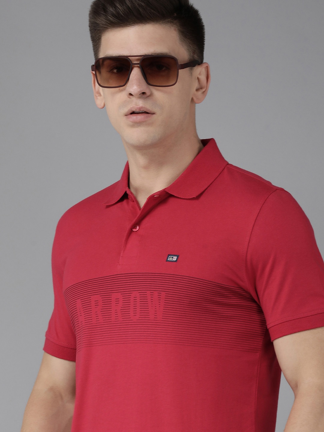 

Arrow Men Red Striped Polo Collar Pure Compact Cotton Slim Fit T-shirt with Brand Logo