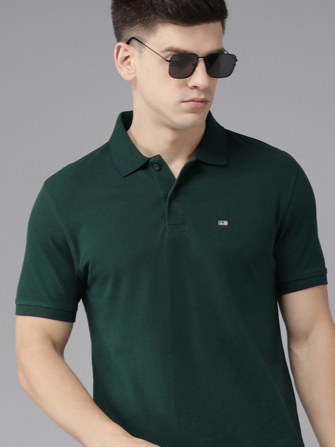 

Arrow Men Green Solid Polo Collar Pure Cotton T-shirt