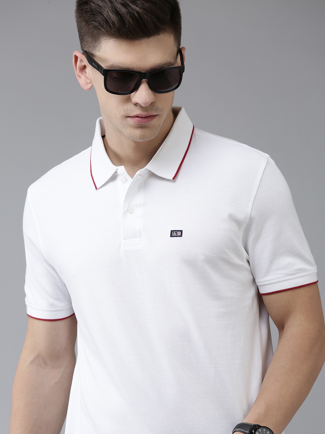 

Arrow Men White Solid Pure Cotton Polo Collar T-shirt