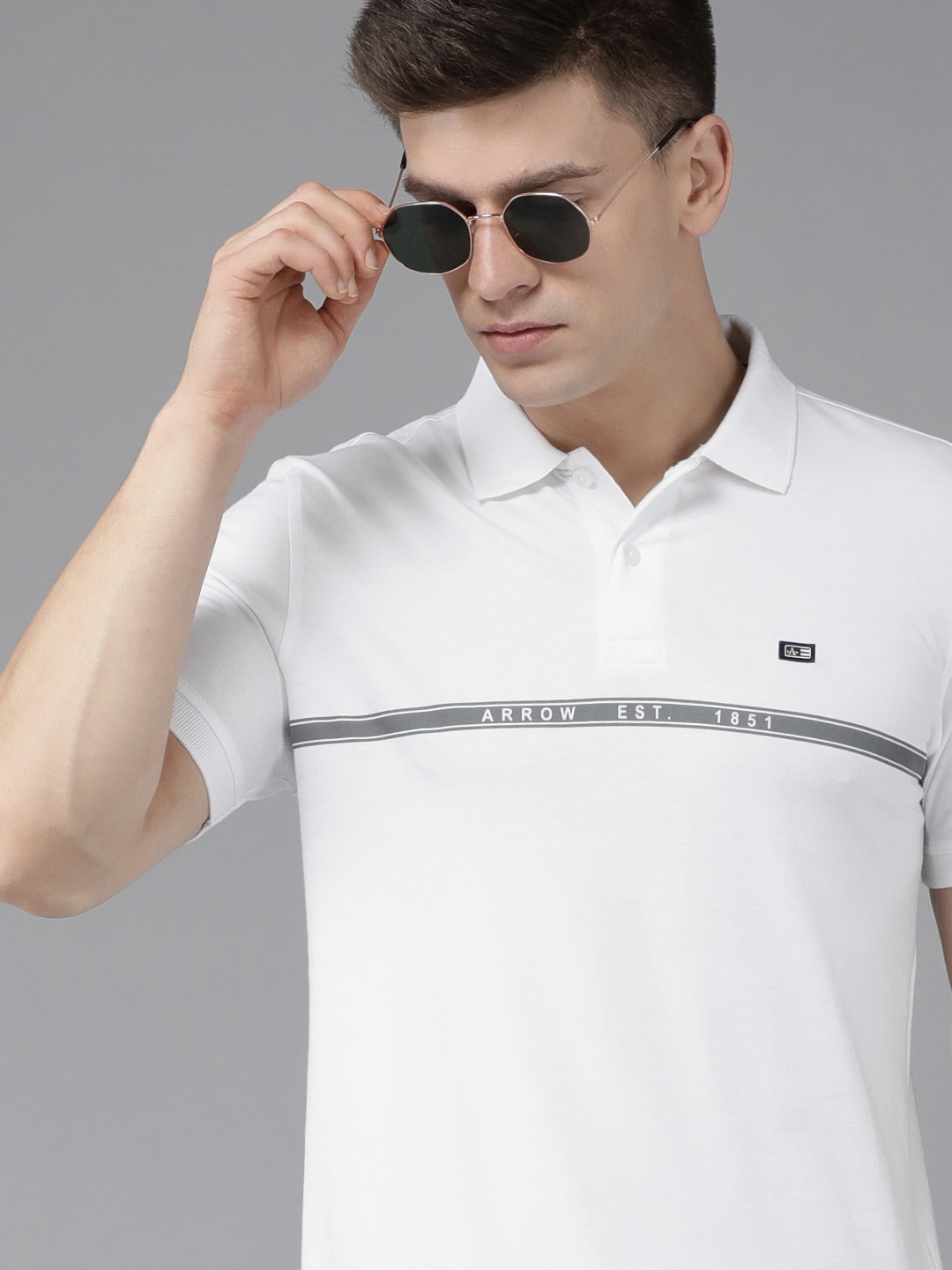 

Arrow Men White Striped Polo Collar Pure Compact Cotton Slim Fit T-shirt With Brand Logo