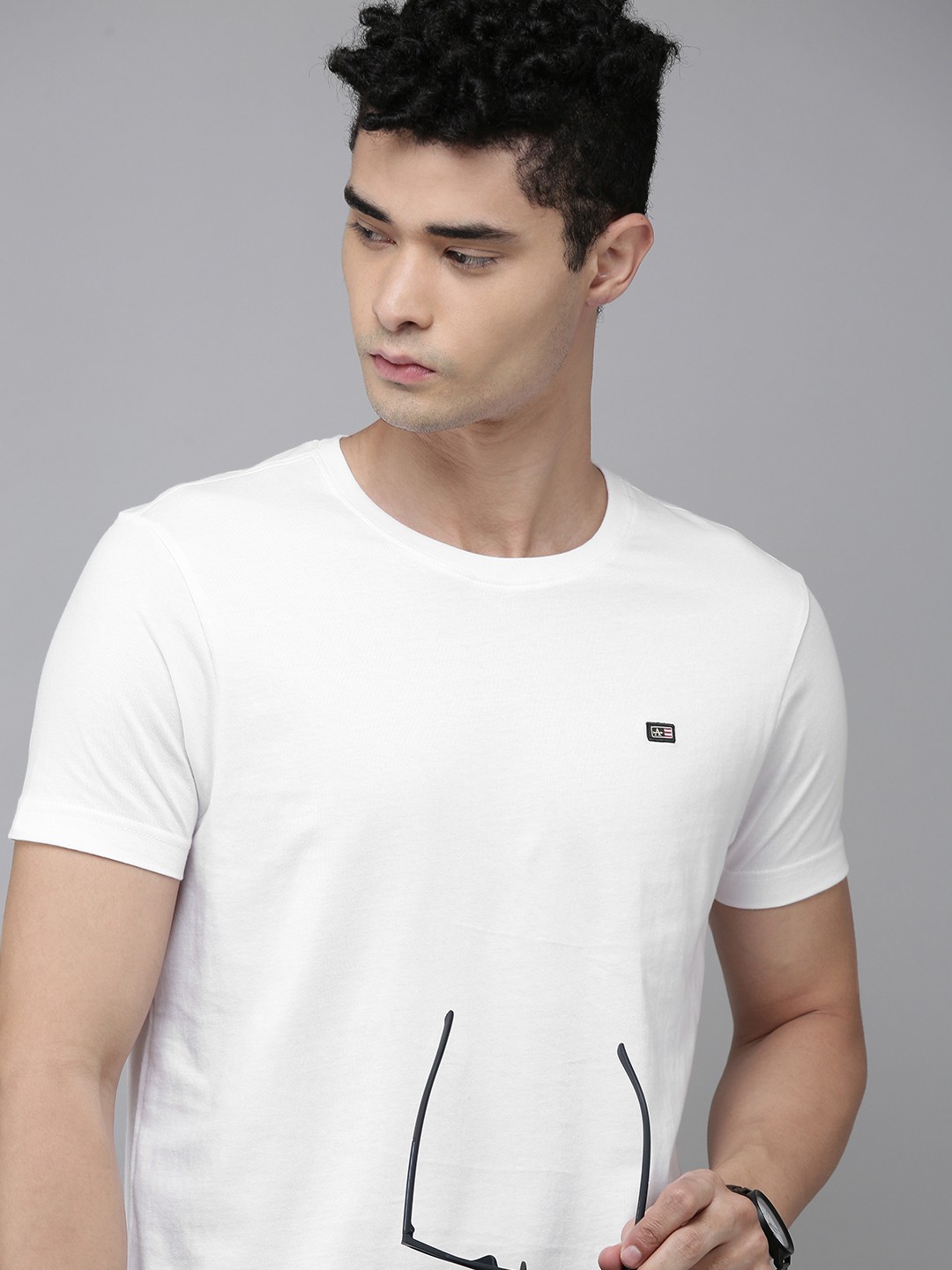 

Arrow Men White Solid Pure Cotton T-shirt