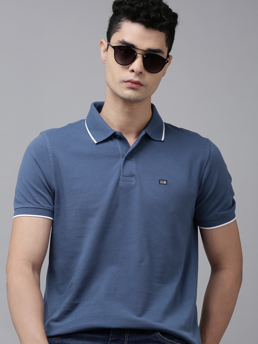 

Arrow Men Blue Solid Regular Fit Polo Collar Pure Cotton Casual T-shirt