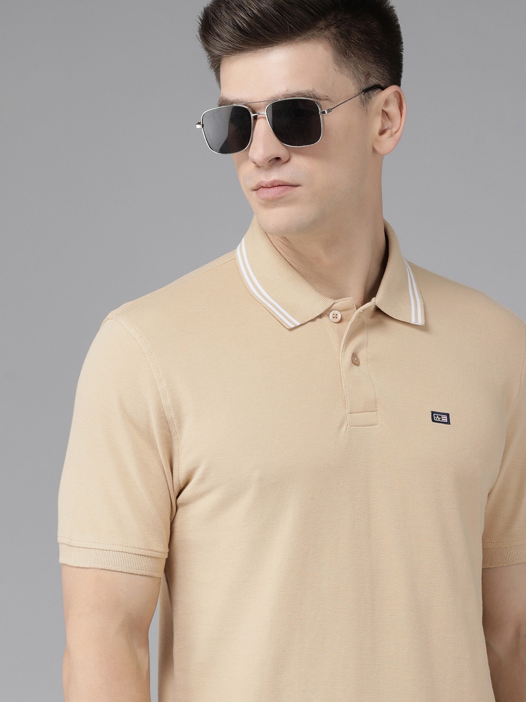 

Arrow Men Beige Polo Collar Pure Cotton T-shirt