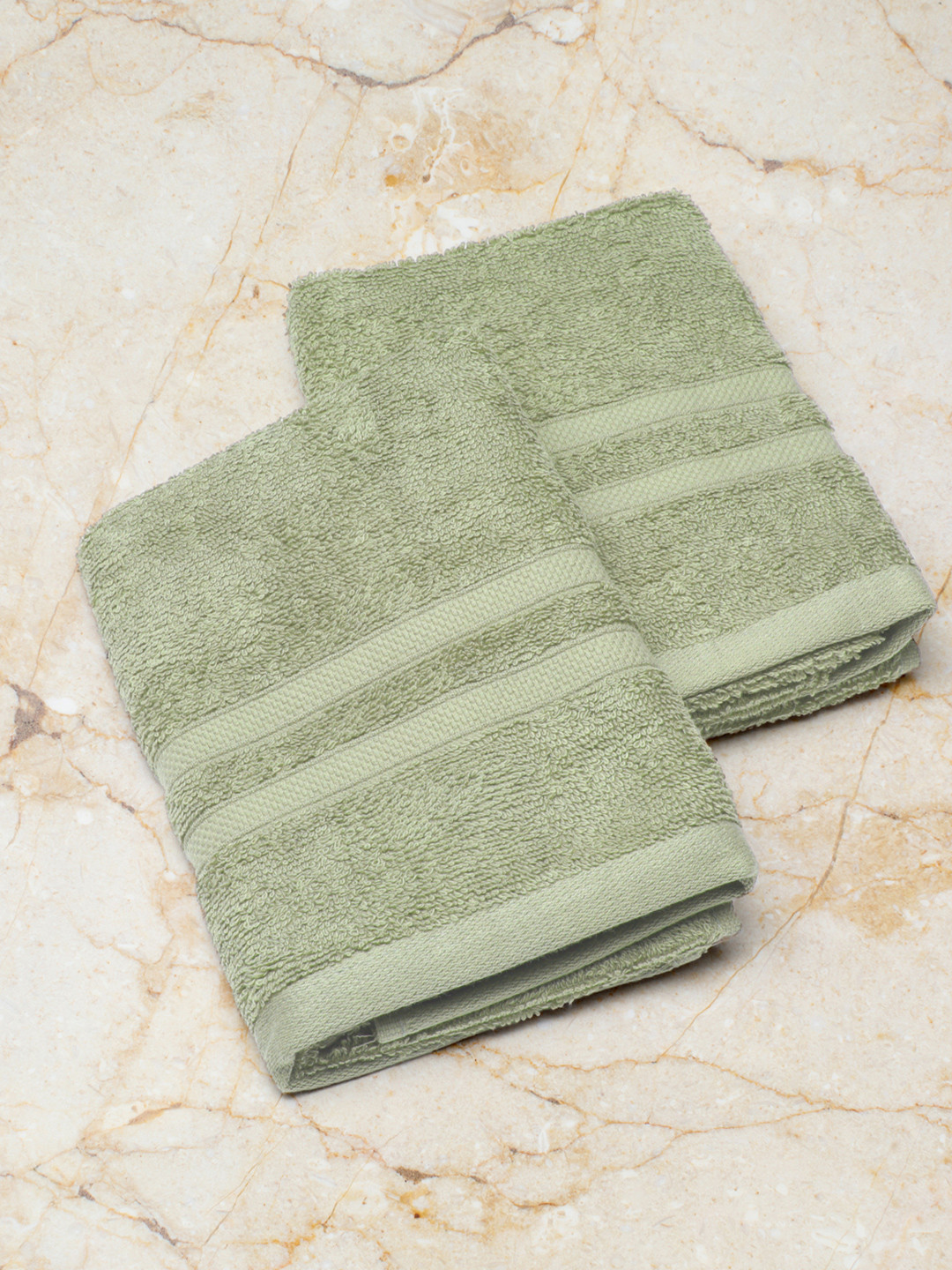

Monte Carlo Pack of 2 Green Solid Cotton Amber Hand Towel