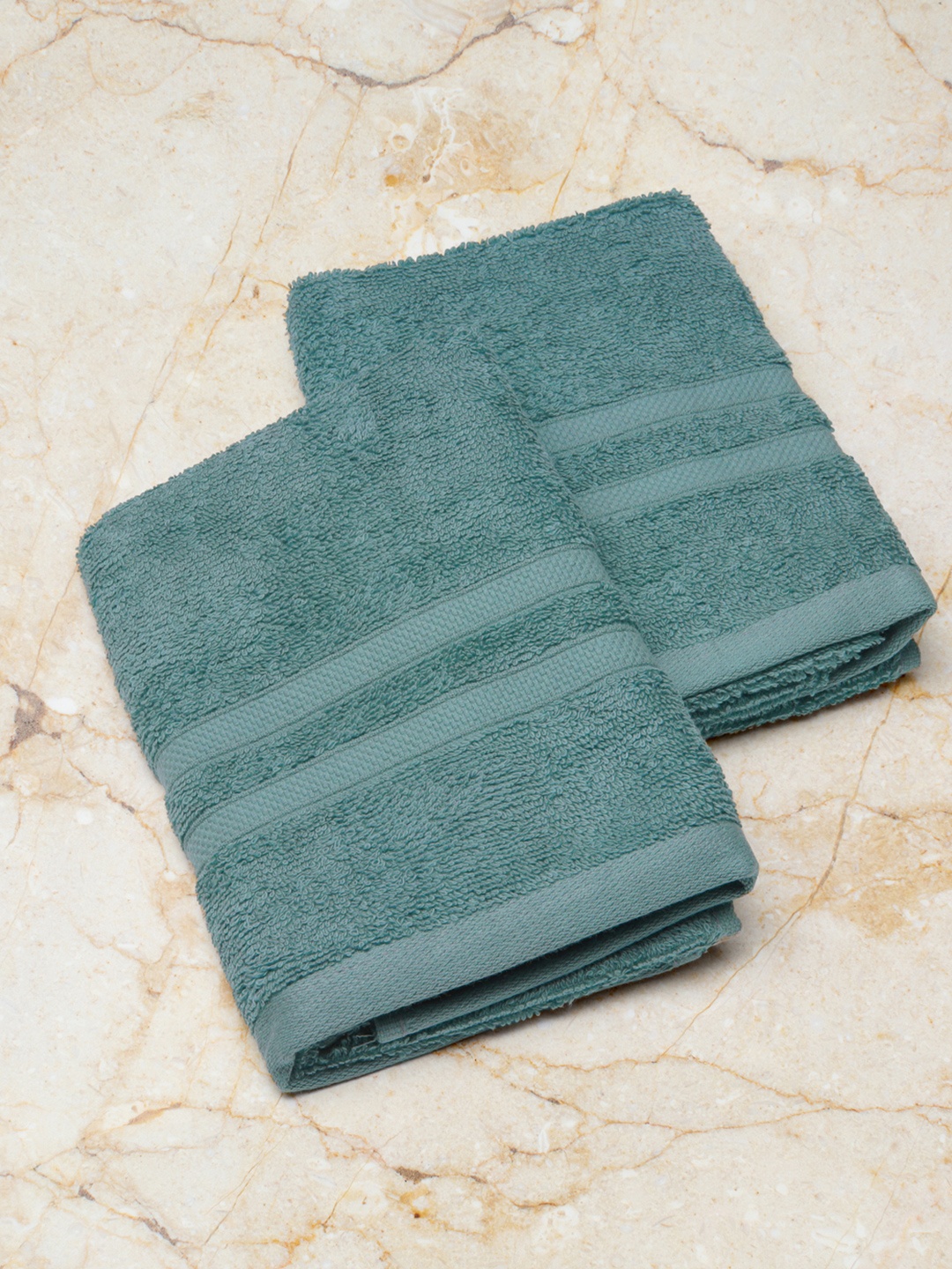 

Monte Carlo Pack of 2 Teal Green Cotton Solid 520 GSM Hand Towel