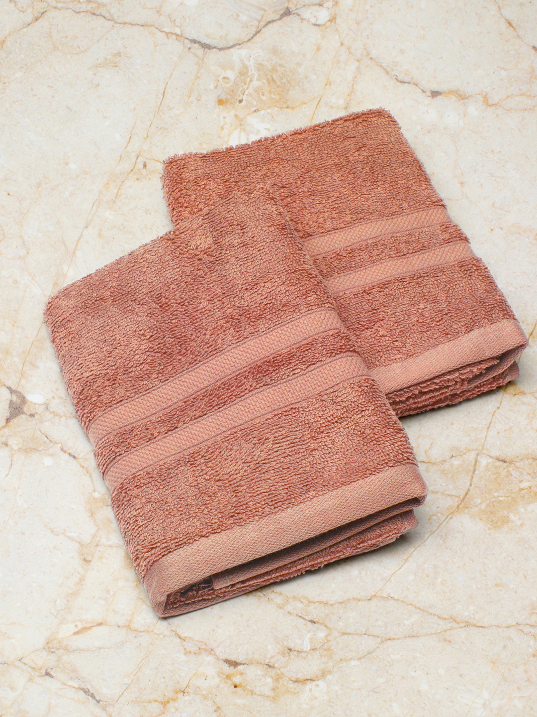 

Monte Carlo Pack of 2 Peach Cotton Solid Hand Towels