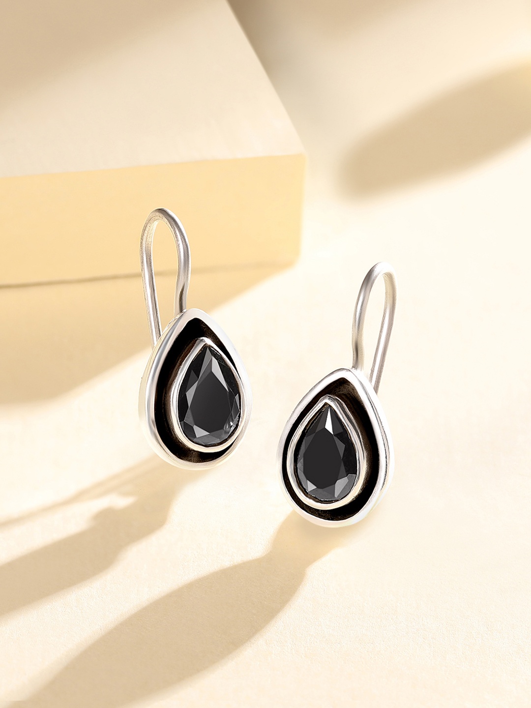 

Silvora by Peora Black Teardrop Shaped Drop Earrings