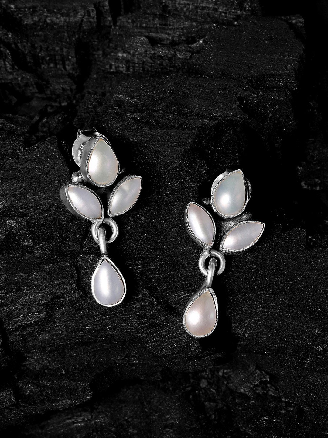 

Silvora by Peora White & Silver-Toned Leaf Shaped Drop Earrings
