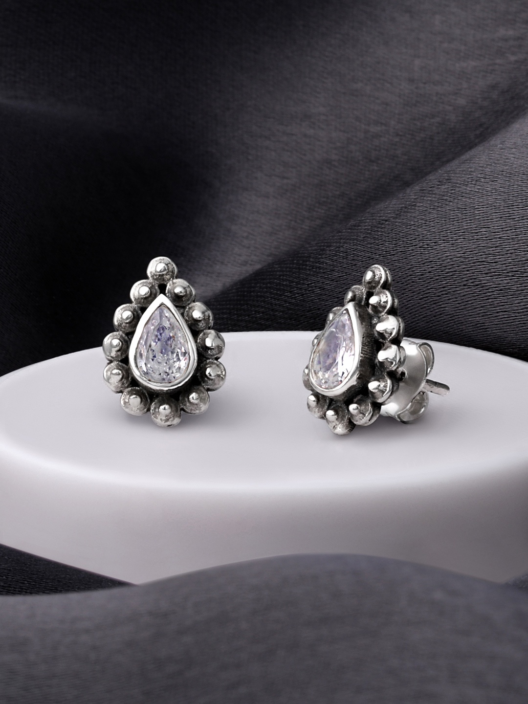 

Silvora by Peora White Teardrop Shaped Sterling Silver Studs Earrings