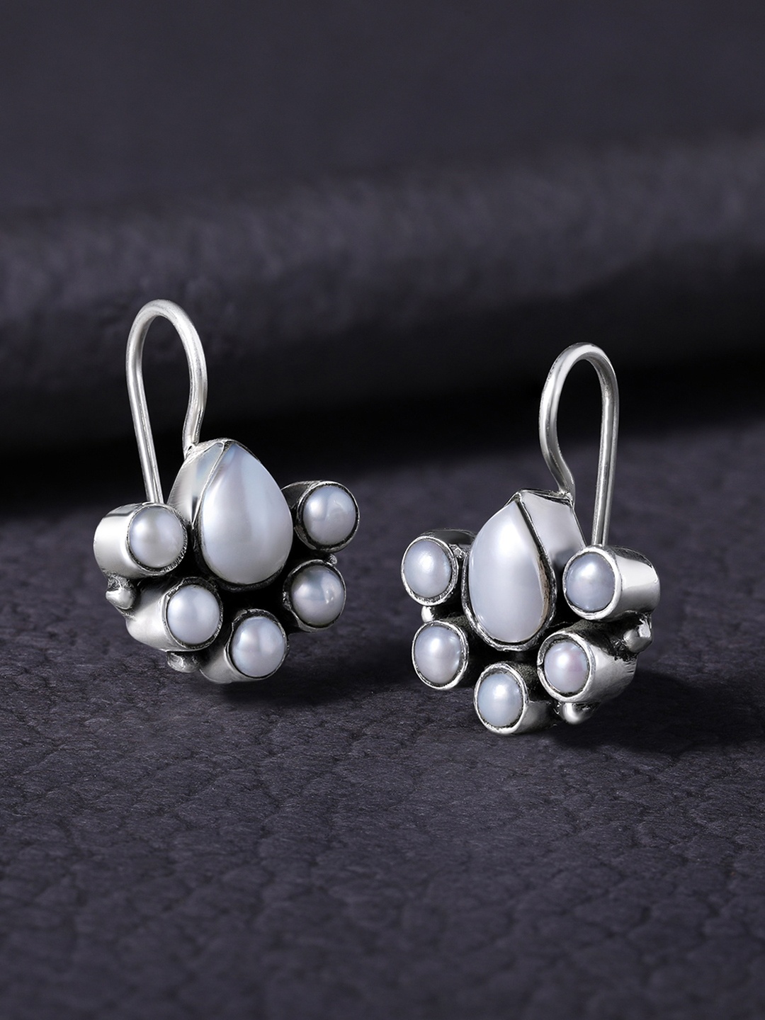 

Silvora by Peora White & Silver Plated Teardrop Shaped Studs Earrings
