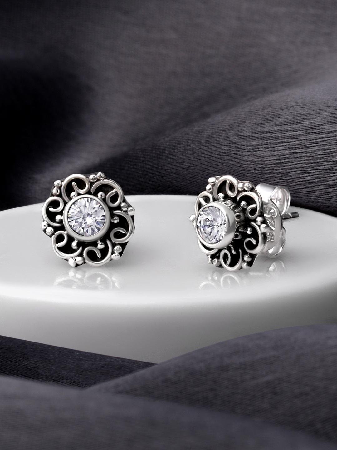 

Silvora by Peora White Floral Studs Earrings Silver Plated
