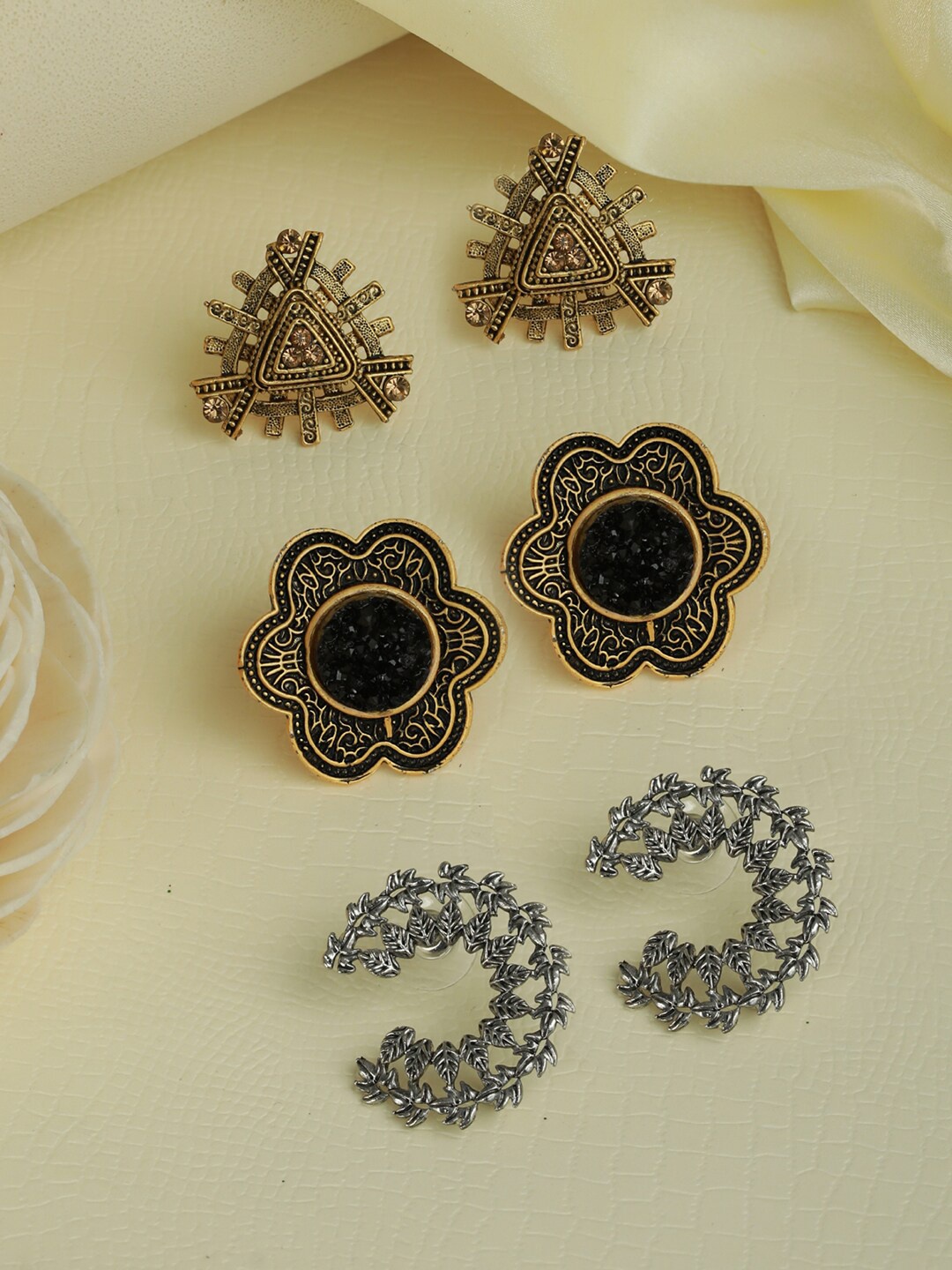 

Priyaasi Gold-Toned Contemporary Studs Earrings