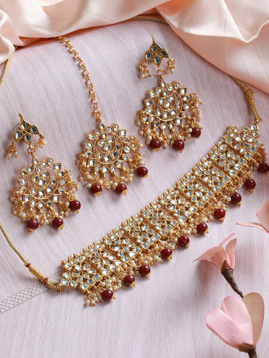 

Priyaasi Gold-Plated White & Maroon Kundan-Studded & Pearl Beaded Jewellery Set
