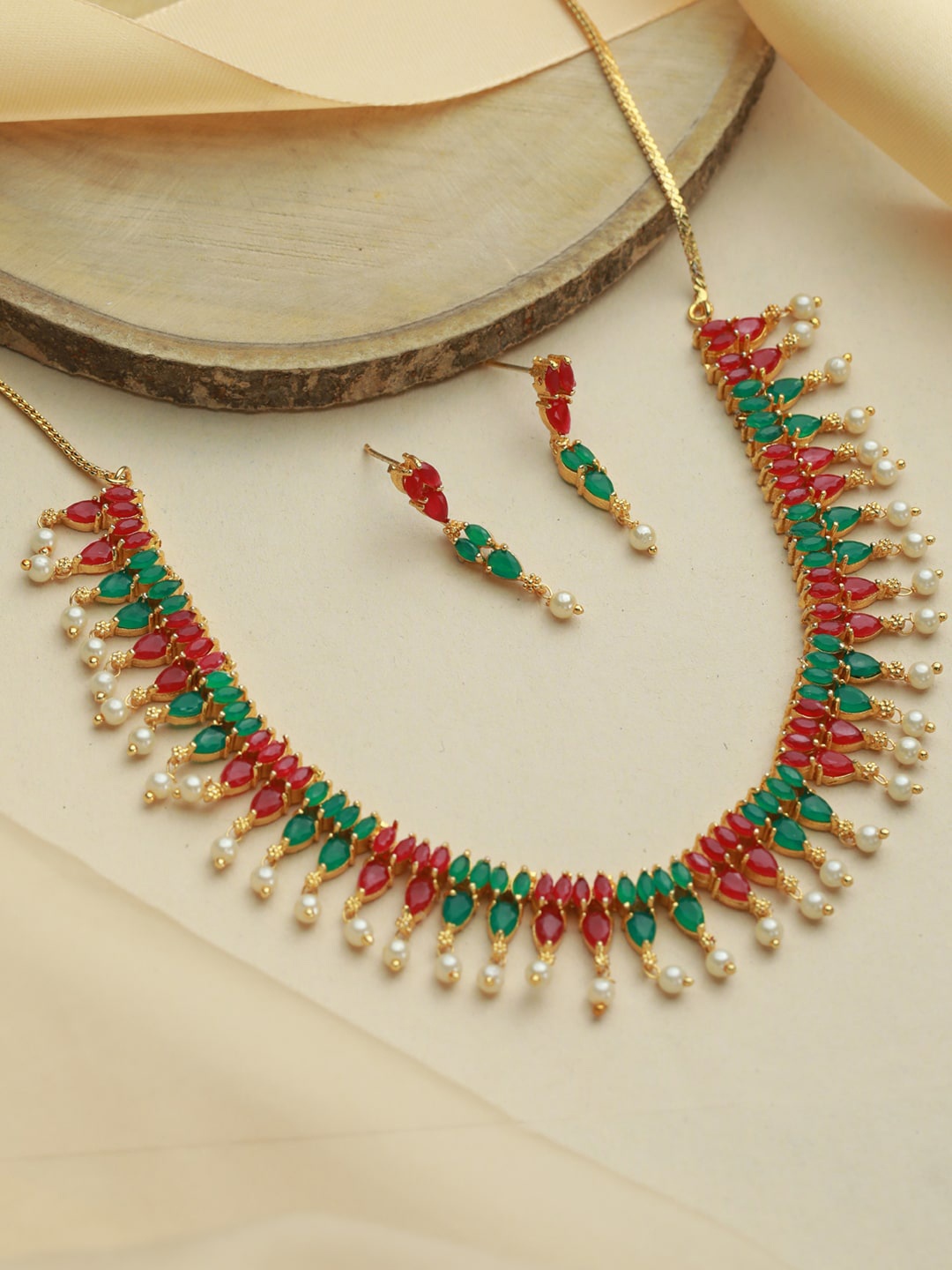 

Priyaasi Gold-Plated Red & Green Leaf Pattern Jewellery Set, Off white