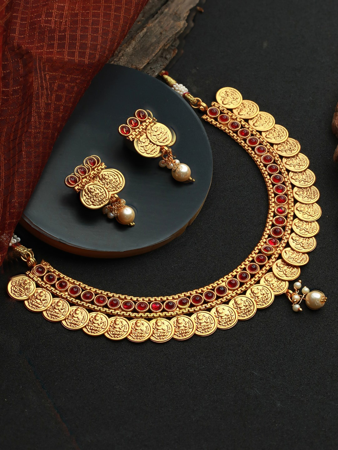 

Priyaasi Gold-Plated Red Stone Studded Goddess Laxmi Necklace & Earrings