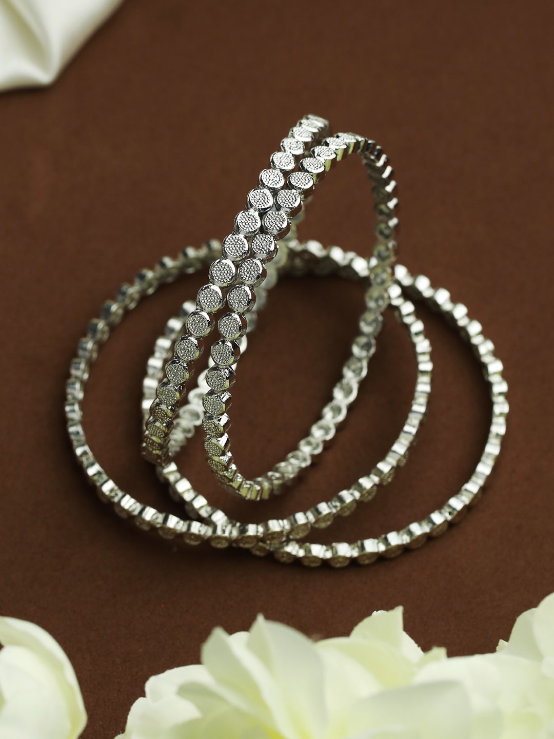 

Priyaasi Women Minimal Silver Plated Embossed Set of 4 Bangles