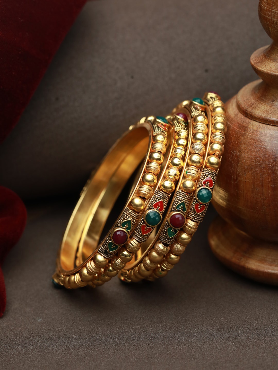 

Priyaasi Women Set of 4 Gold-Plated Green & Red Stone Studded Bangle