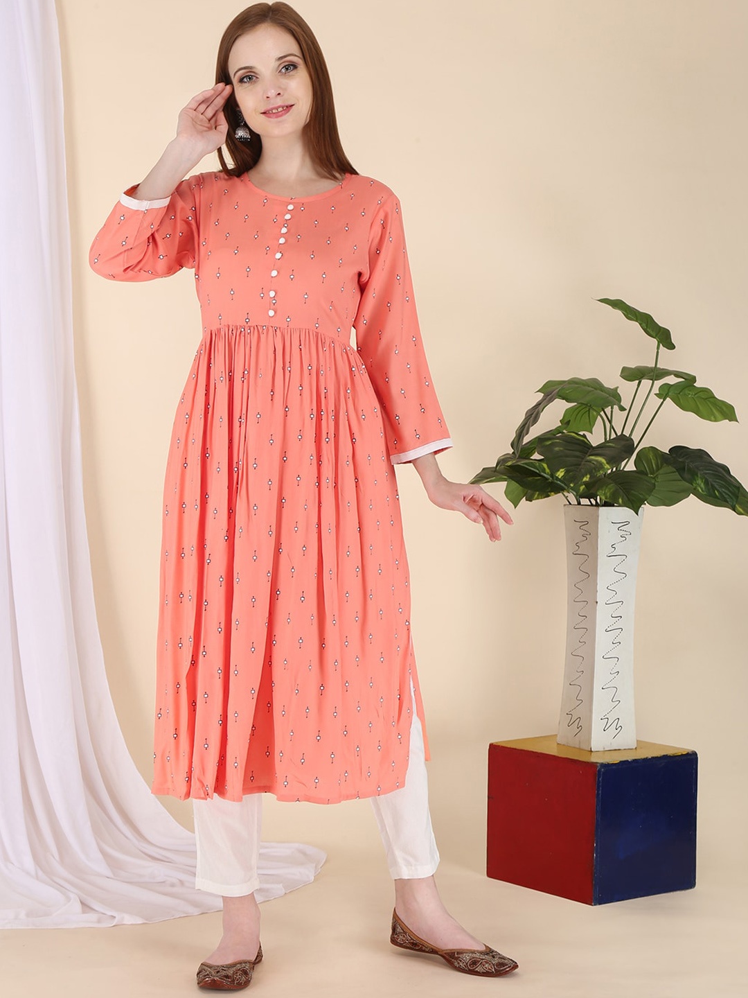 

ERISHA Women Peach-Coloured Mirror Work Floral Kurta