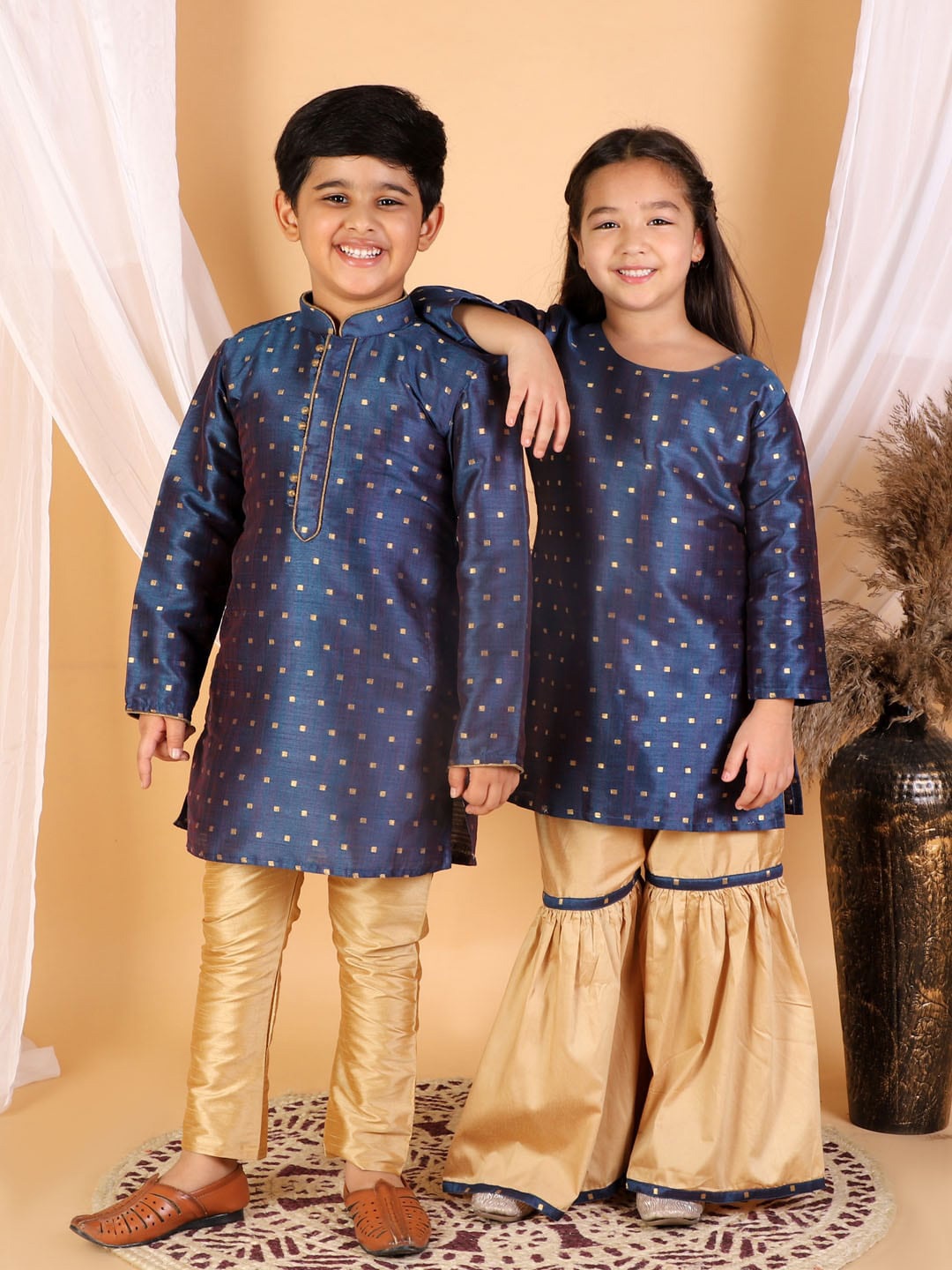 

VASTRAMAY Girls Blue & Rose Gold Embellished Kurta And Sharara