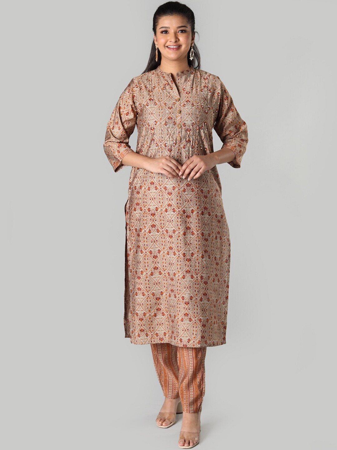 

taruni Women Brown Floral Embroidered Kurta with Trousers