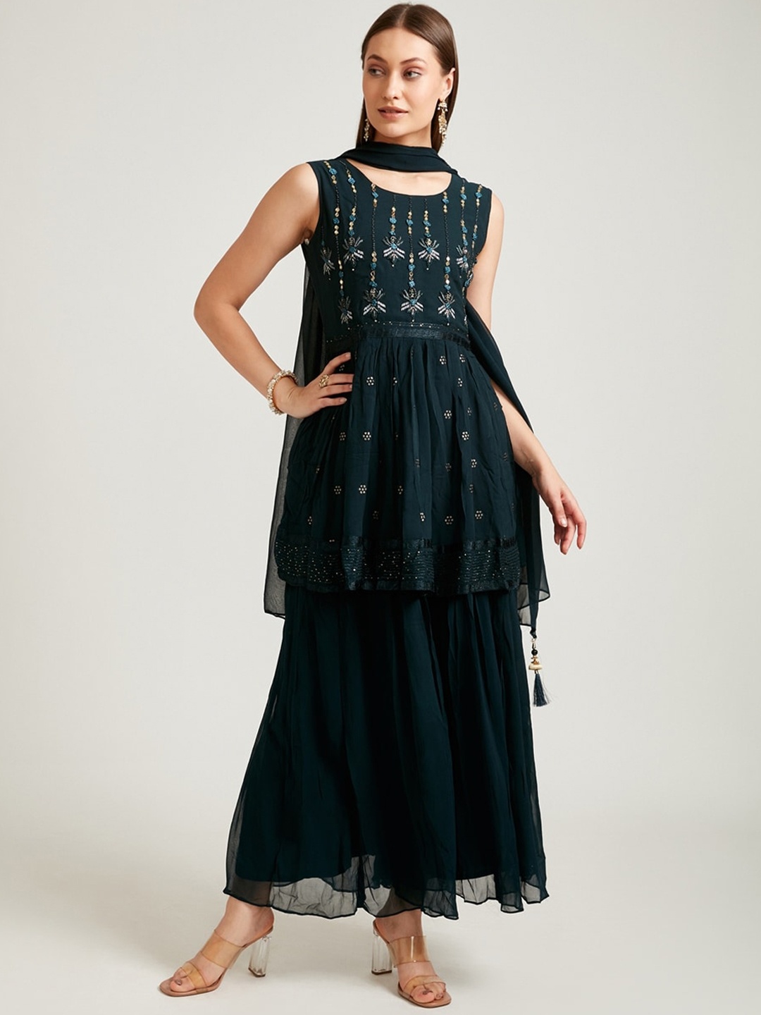 

Neerus Women Blue Embroidered Pleated Beads and Stones Kurti with Sharara