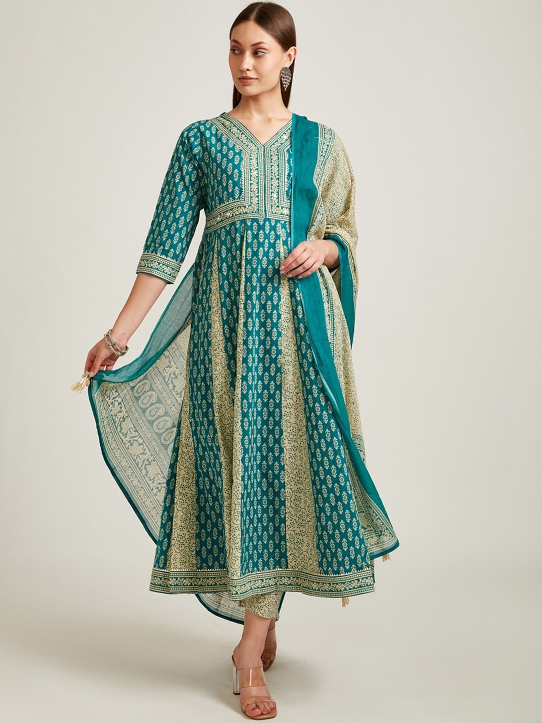 

Neerus Women Turquoise Blue Ethnic Motifs Empire Mirror Work Pure Cotton Kurta Set