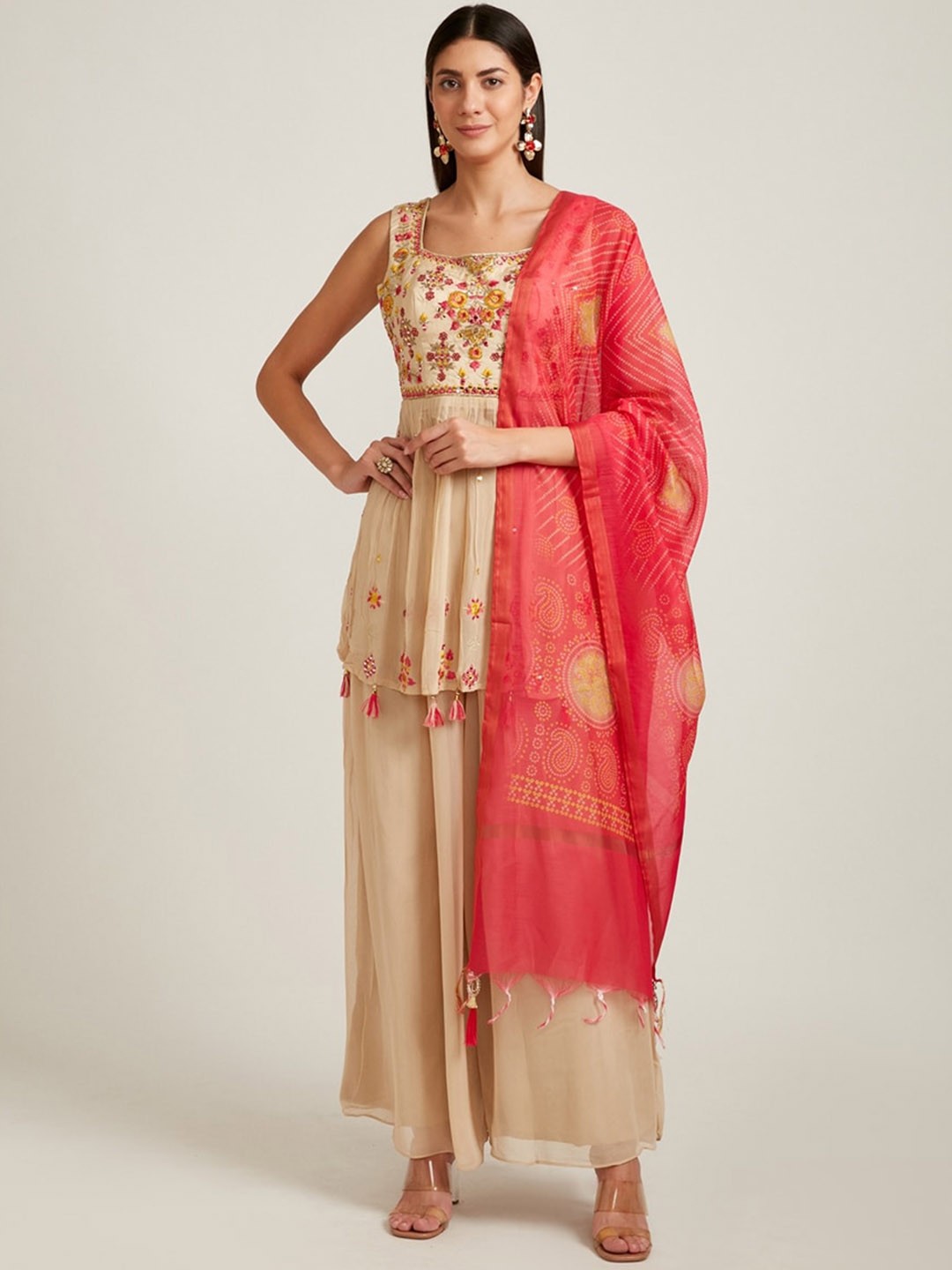 

Neerus Women Beige Floral Embroidered Thread Work Kurta with Sharara & With Dupatta