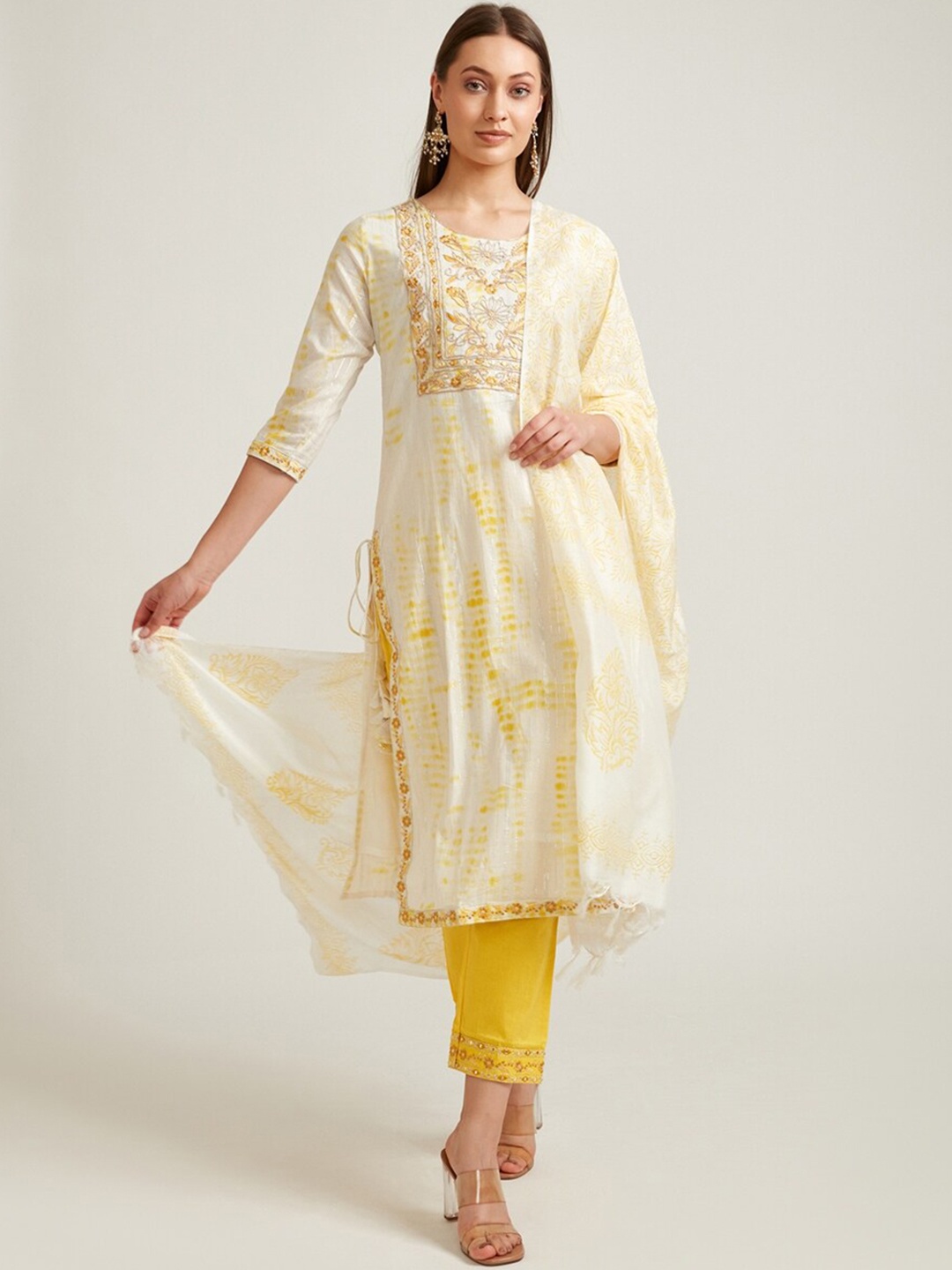 

Neerus Women Yellow Dyed Thread Work Pure Cotton Kurti with Trousers