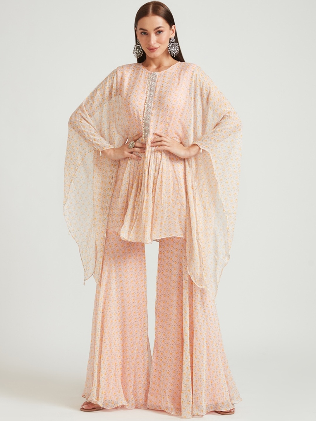 

Neerus Women Peach-Coloured Ethnic Motifs Printed Pleated Beads and Stones Kurta with Sharara