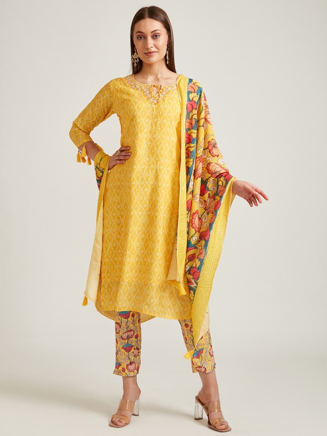 

Neerus Women Mustard Yellow Bandhani Printed Thread Work Kurta with Trousers & Dupatta