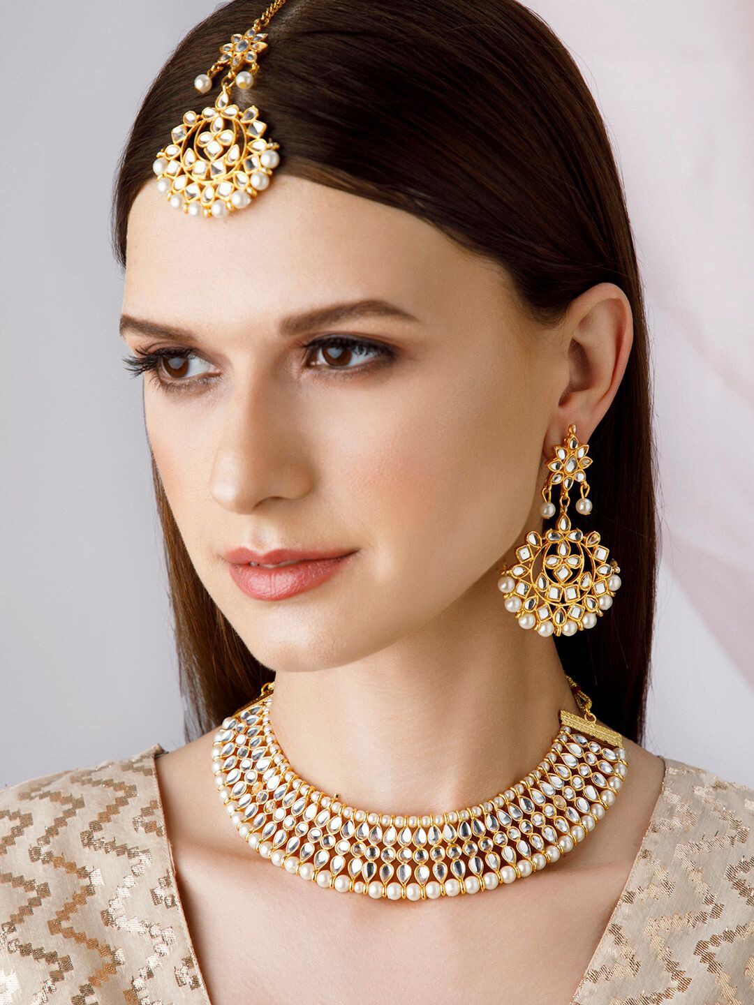 

Rubans Gold-Plated White Kundan Studded & Beaded Jewellery Set