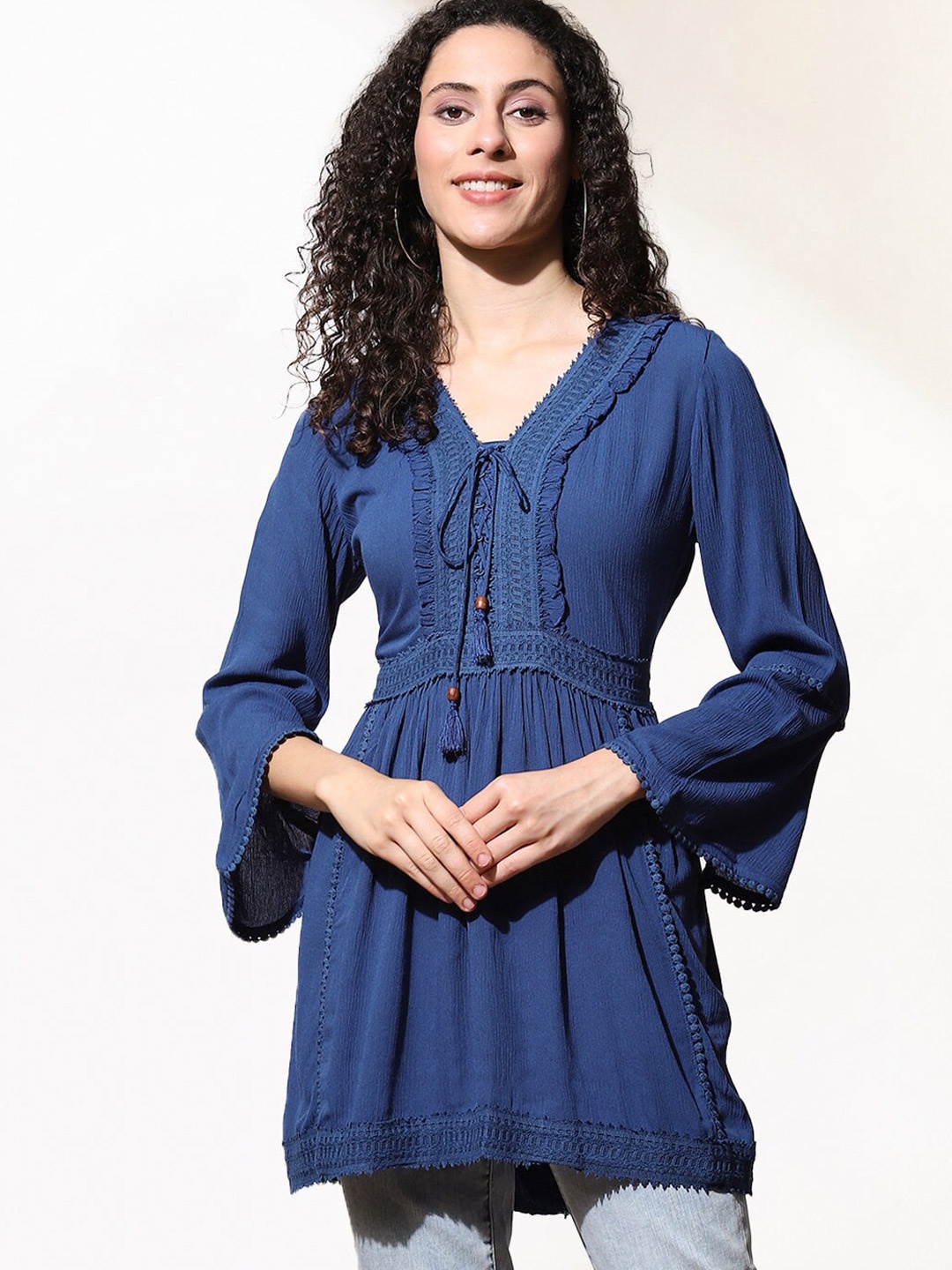 

Lakshita Women Blue Tie-Up Neck Empire Longline Top