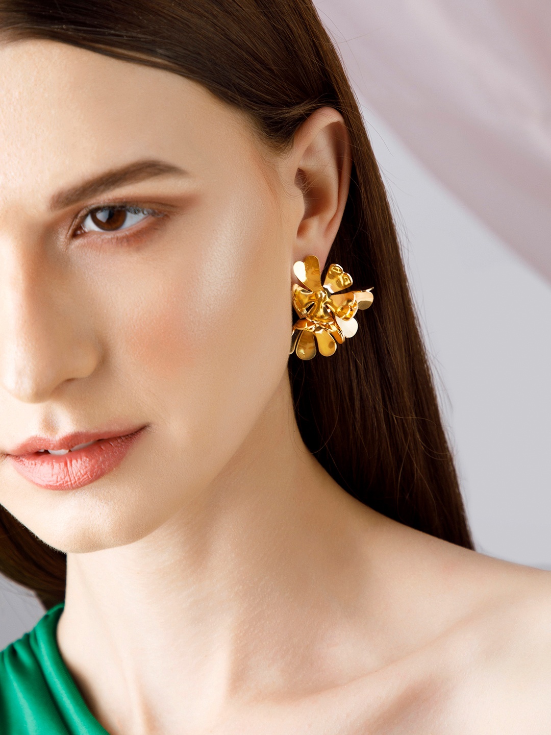 

Rubans Voguish Gold-Toned Floral Studs Earrings
