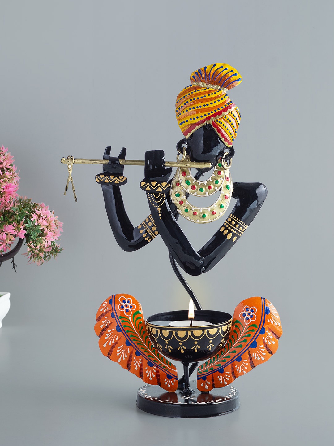 

Golden Peacock Multicolored Krishna Shaped Candle Holder, Multi