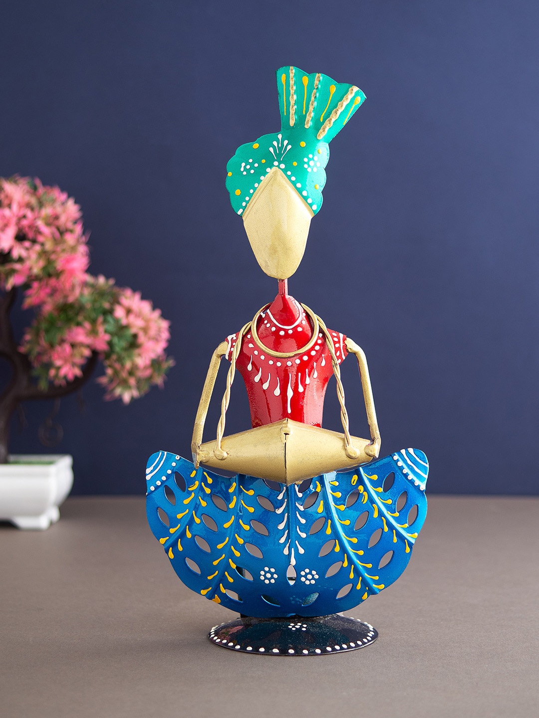 

Golden Peacock Red & Blue Musician Figurine T- Light Candle Holder Showpieces