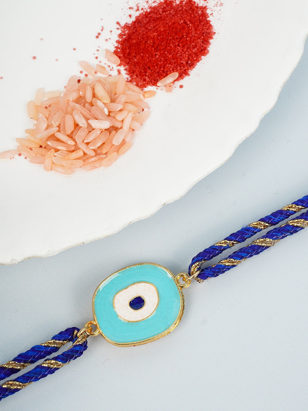 

Ferosh Men Blue Evil Eye Rakhi With Roli Chawal