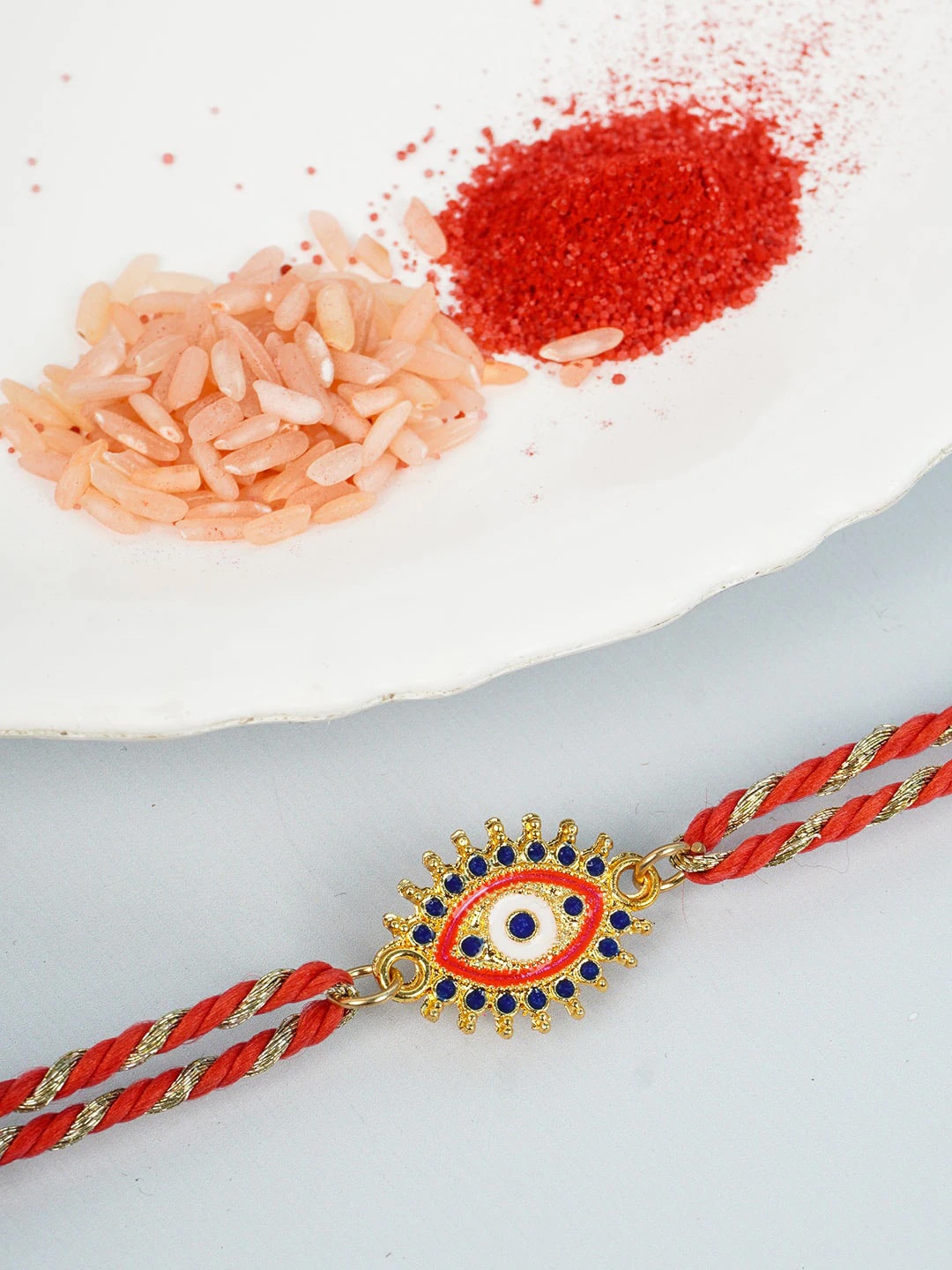

Ferosh Men Red & Gold-Toned Evil Eye Rakhi