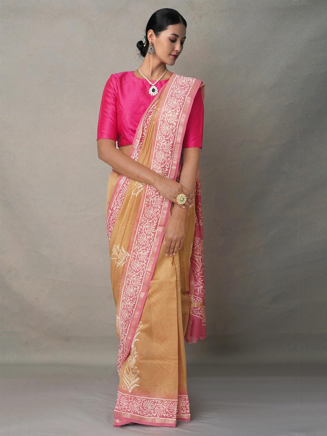 

Unnati Silks Brown & Pink Ethnic Motifs Zari Silk Blend Baluchari Saree