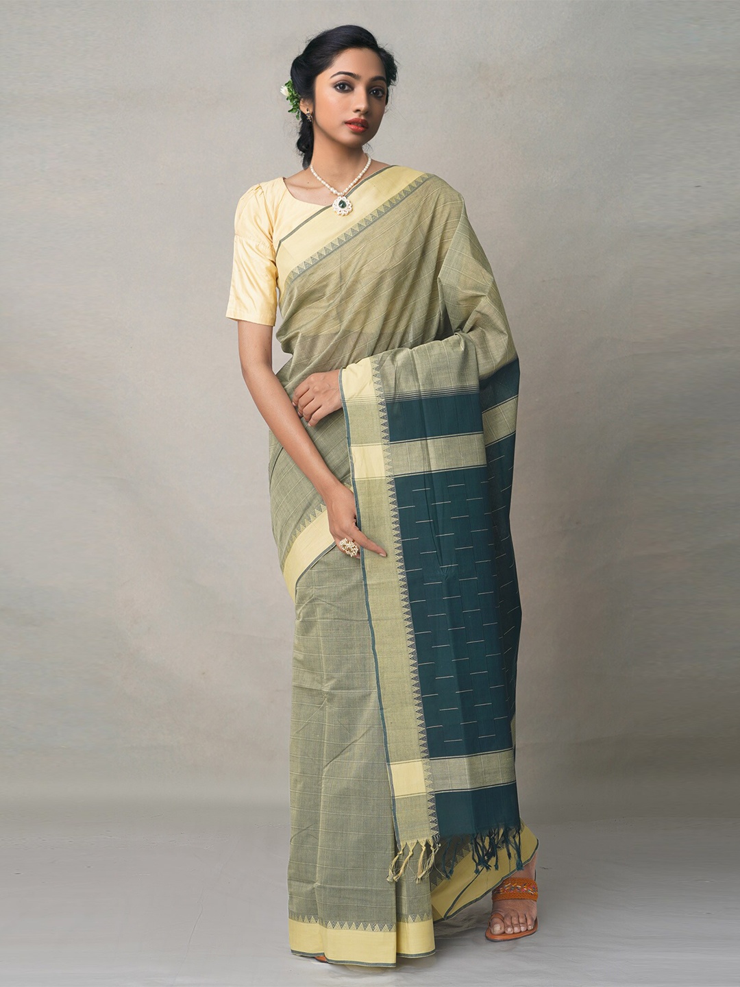 

Unnati Silks Green & Beige Woven Design Zari Pure Cotton Chettinad Saree