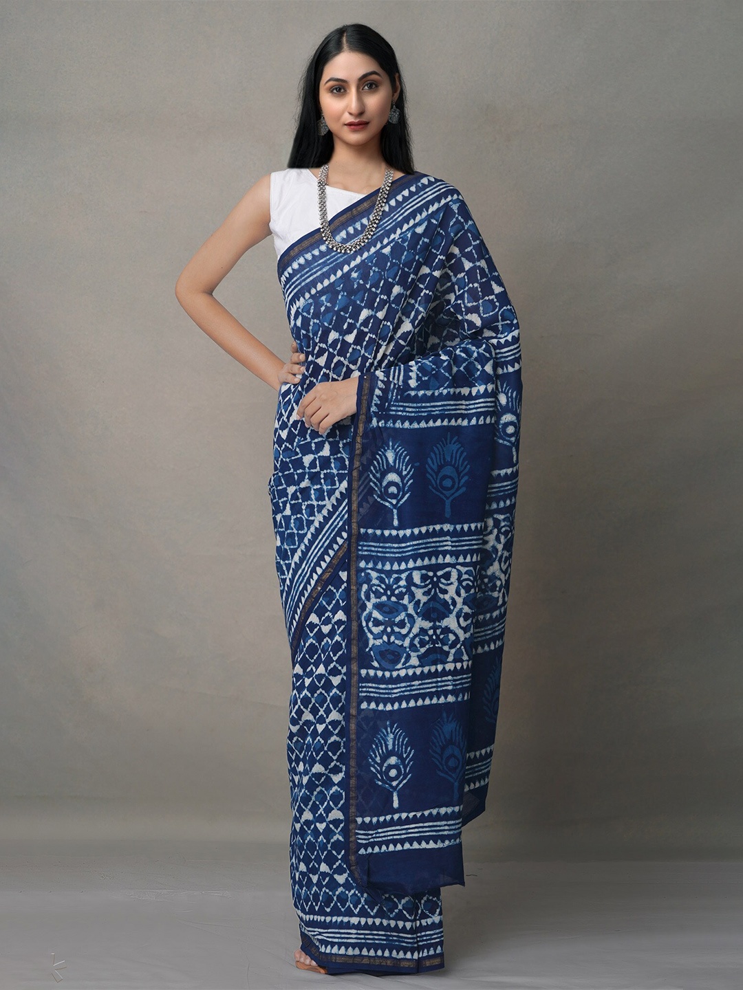 

Unnati Silks Blue & White Dabu Handloom Sustainable Silk Cotton Chanderi Saree