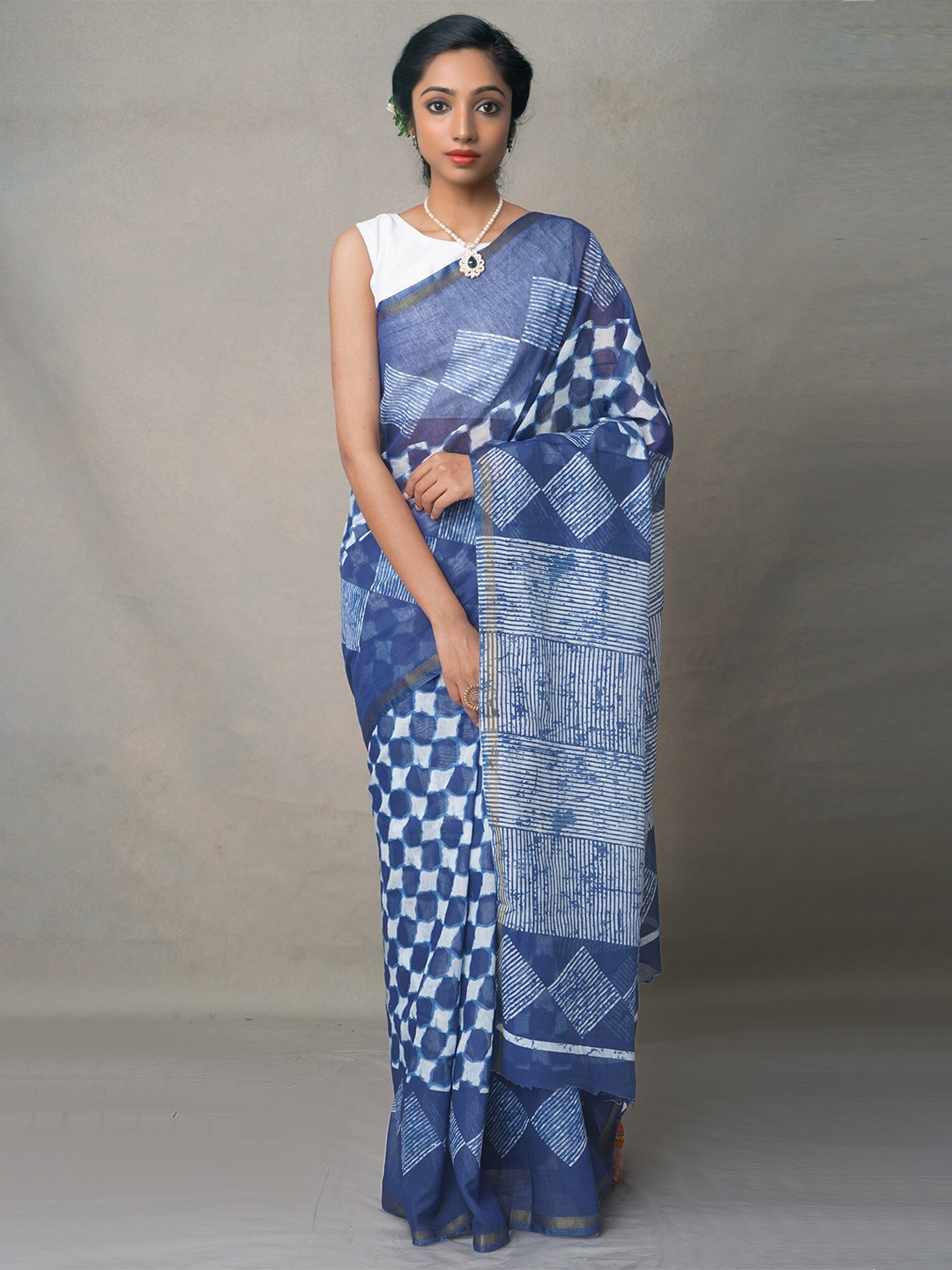 

Unnati Silks Blue & White Dabu Silk Cotton Chanderi Saree