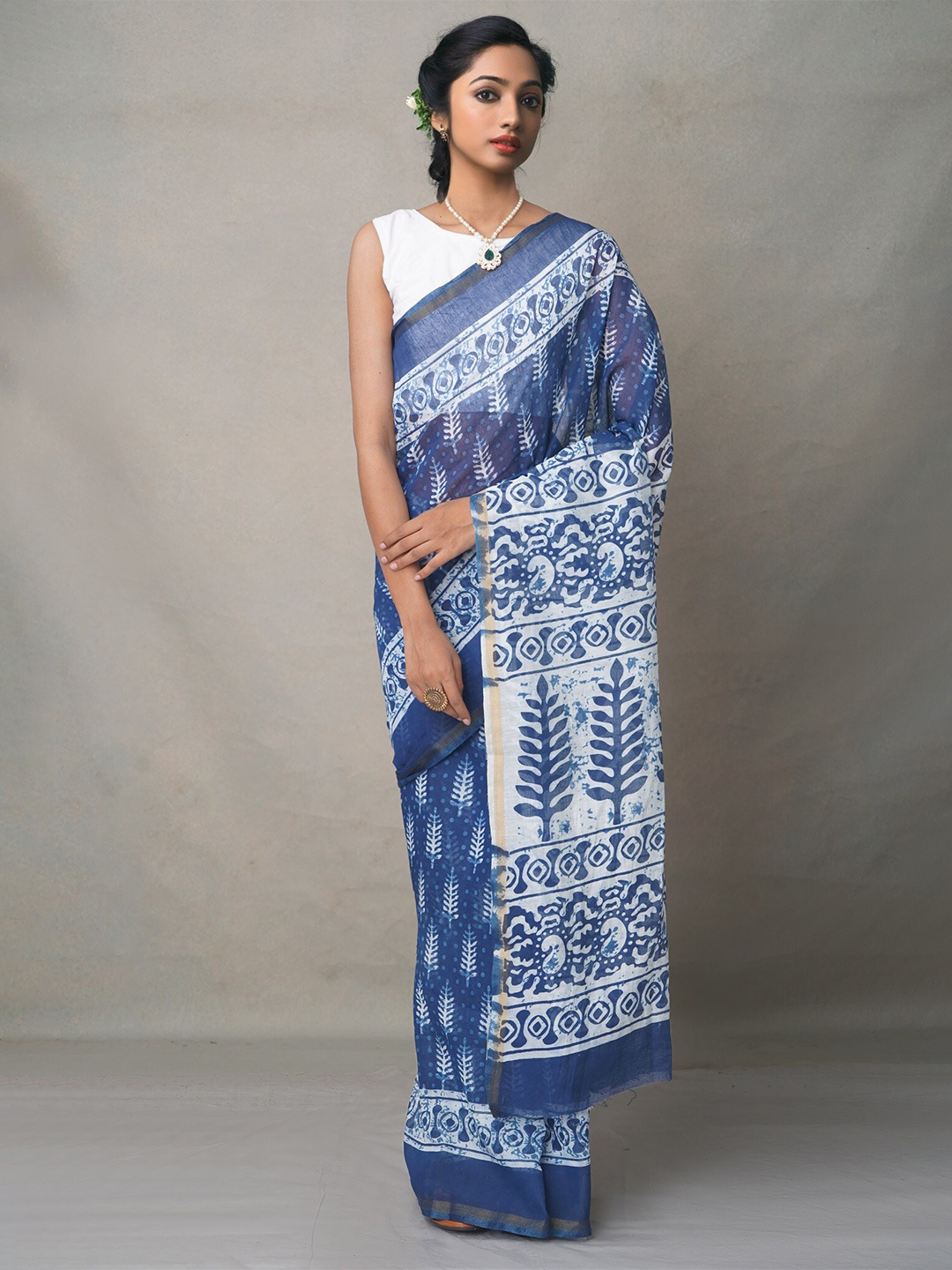 

Unnati Silks Blue & White Dabu Silk Cotton Chanderi Saree
