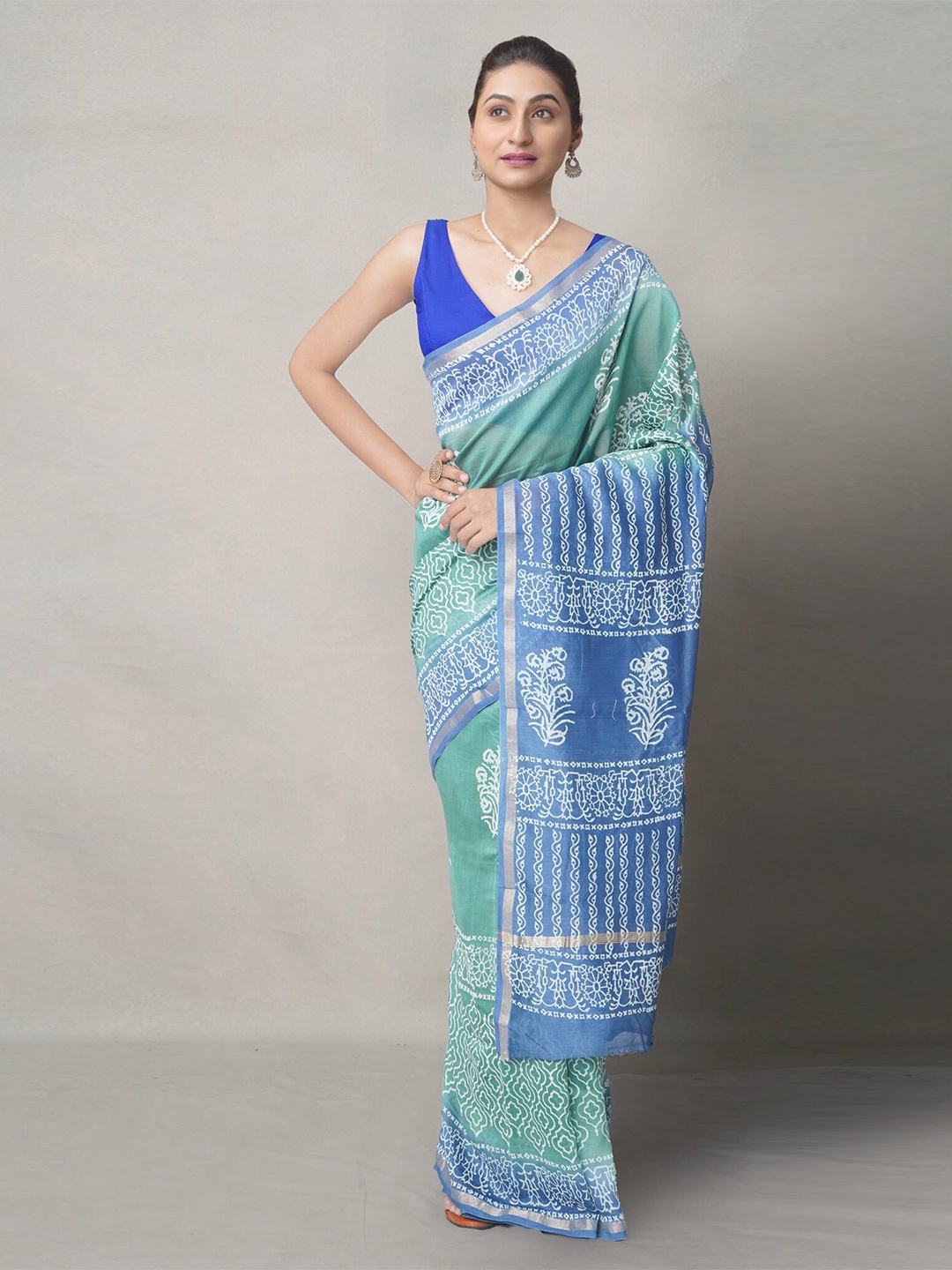 

Unnati Silks Green & Blue Ethnic Motifs Silk Blend Baluchari Saree