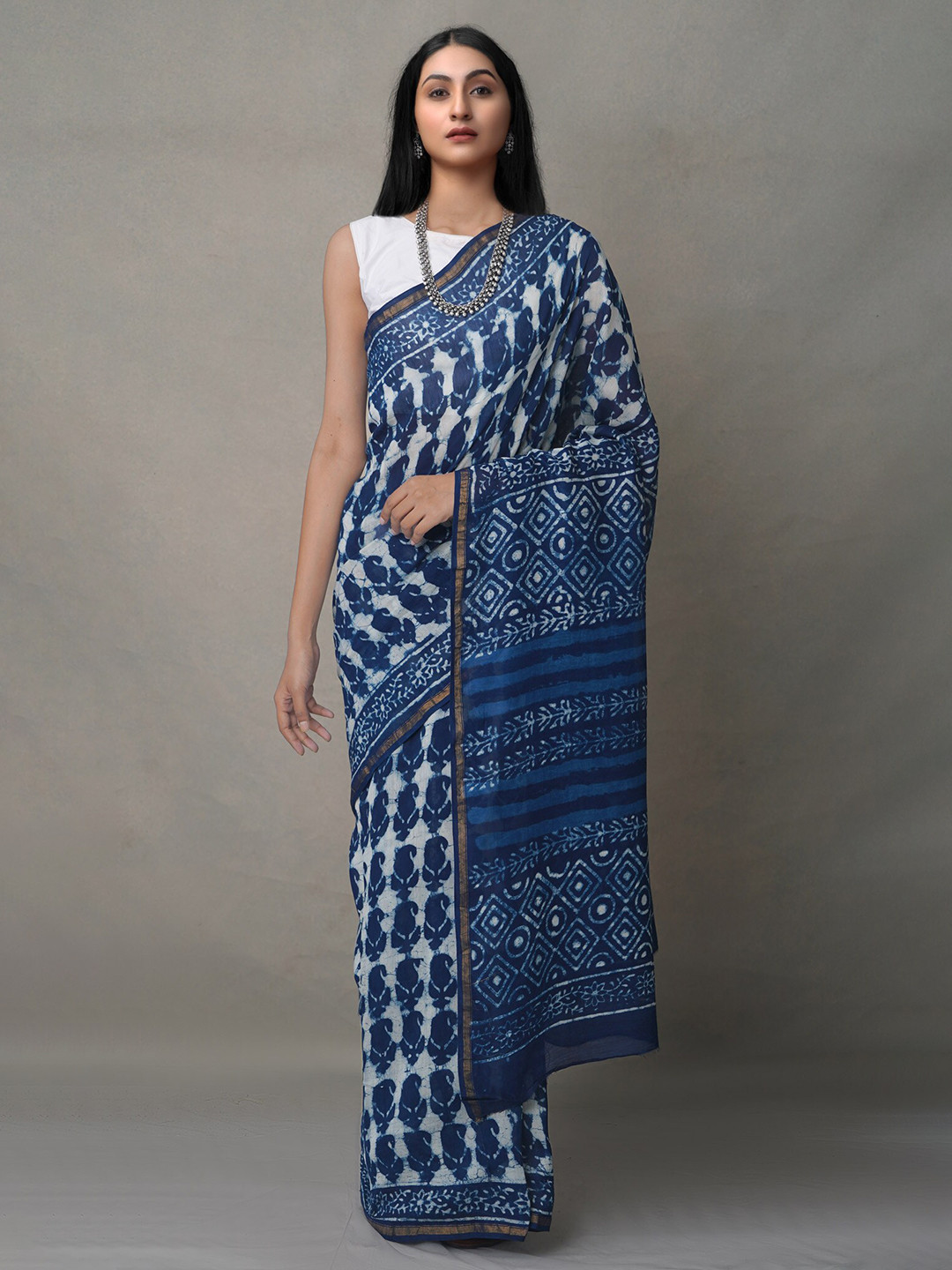 

Unnati Silks Blue & White Dabu Silk Cotton Chanderi Saree
