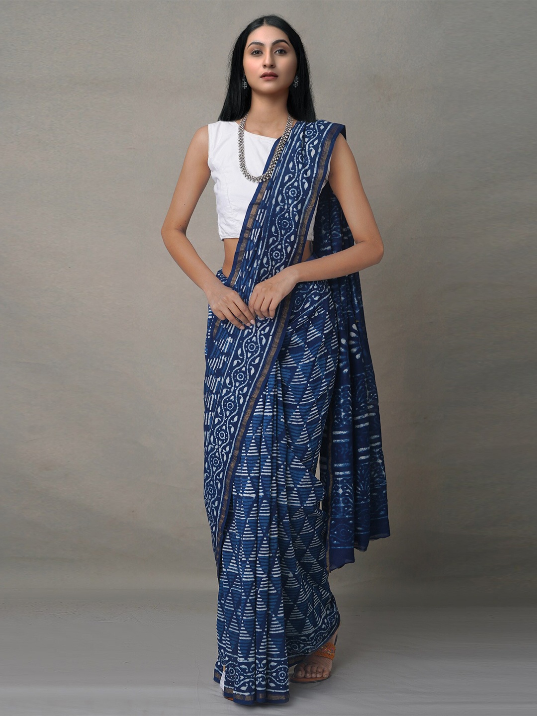 

Unnati Silks Blue & White Dabu Silk Cotton Chanderi Saree