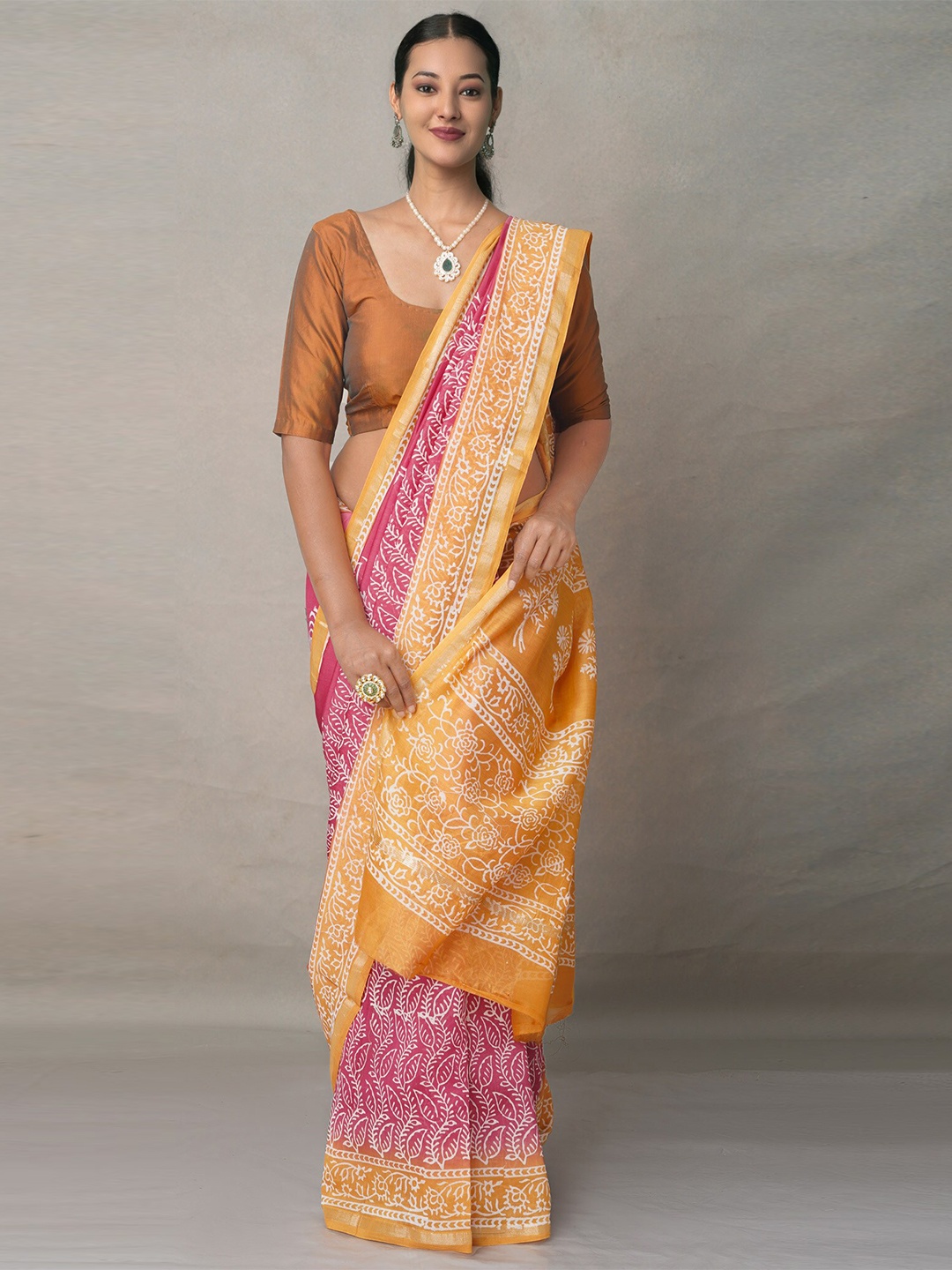 

Unnati Silks Pink & White Ethnic Motifs Zari Baluchari Saree