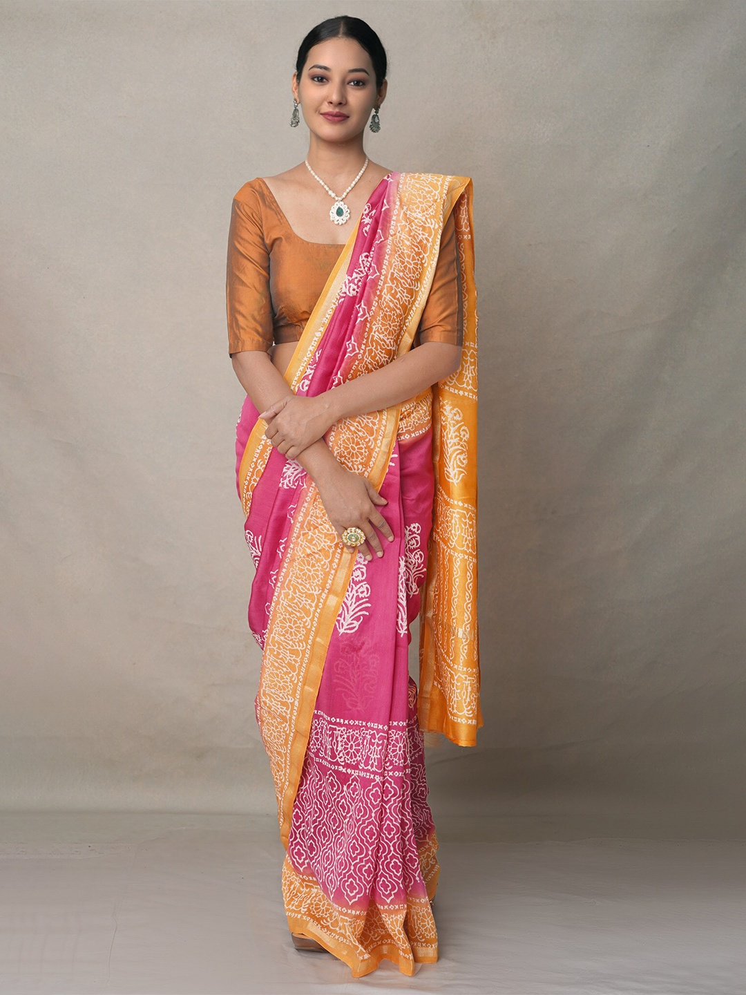 

Unnati Silks Pink & Yellow Ethnic Motifs Zari Silk Blend Baluchari Saree