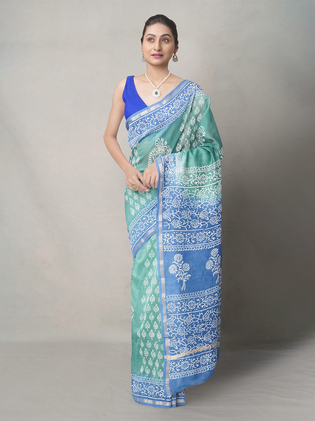 

Unnati Silks Green & Blue Ethnic Motifs Silk Blend Baluchari Saree